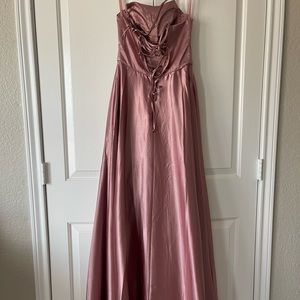 Long formal dress, longer than it looks on the photo. Never worn.